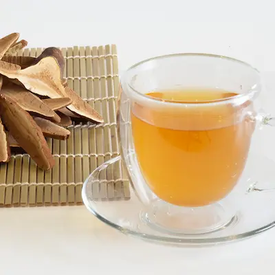 Nấm Linh Chi - Nấm Lim Xanh Ngọc Anh 29 ly nước nấm lim xanh rừng thái lát đã sắc, minh họa chế biến nhanh và hiệu quả